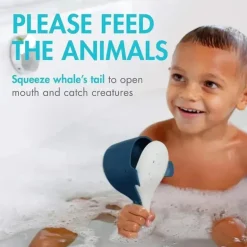 Boon - Brinquedo de banho para bebês baleia faminta CHOMP