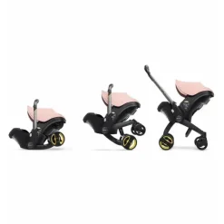 Doona - Assento de carro infantil com base e carrinho, rosa claro