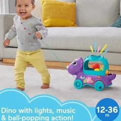 Fisher Price - Brinquedo de aprendizagem infantil Poppin' Triceratops Dinosaur Pull-Along Ball Popper
