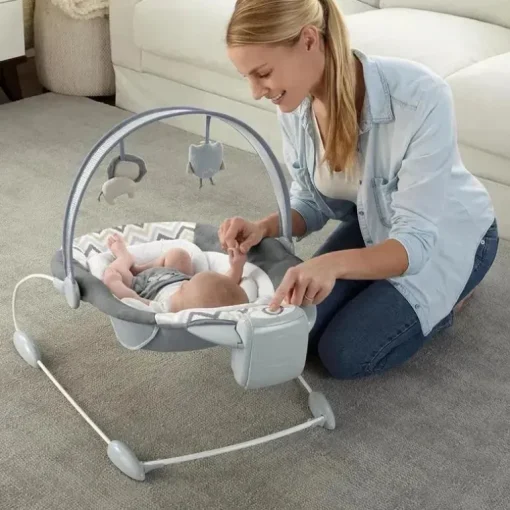 Ingenuity - Assento de segurança automático para bebê SmartBounce com ruído branco, Braden