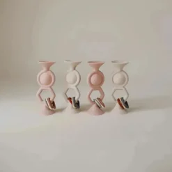 Mushie - Brinquedo de sucção Hexapop, areia movediça