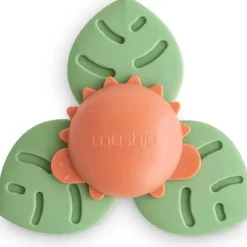 Mushie - brinquedo giratório de sucção Dino para banho e brincadeira
