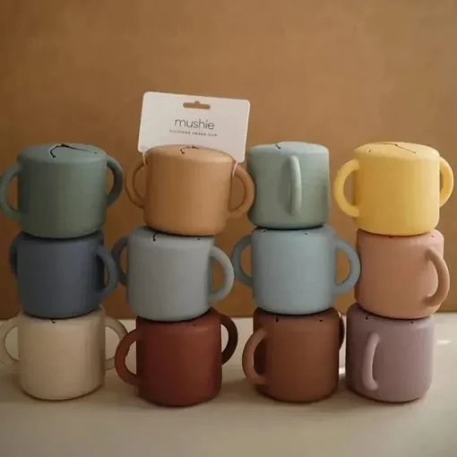 Mushie - Copo para lanche de silicone para bebês, areia movediça
