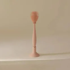 Mushie - Escova para mamadeira, silicone macio com base de sucção, blush