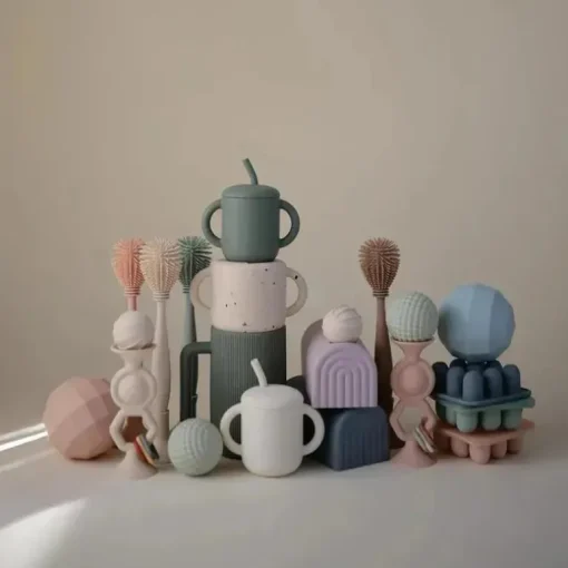 Mushie - Escova para mamadeira, silicone macio com base de sucção, areia móvel