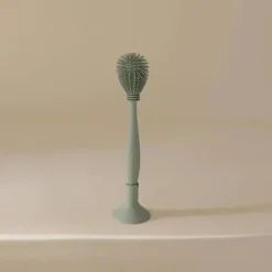 Mushie - Escova para mamadeira, silicone macio com base de sucção, Cambridge Blue