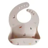 Mushie - Silicone Baby Bib, Dinosaurs