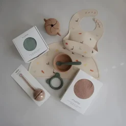 Mushie - Silicone Baby Bib, Dinosaurs