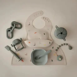 Mushie - Silicone Baby Bib, Dinosaurs