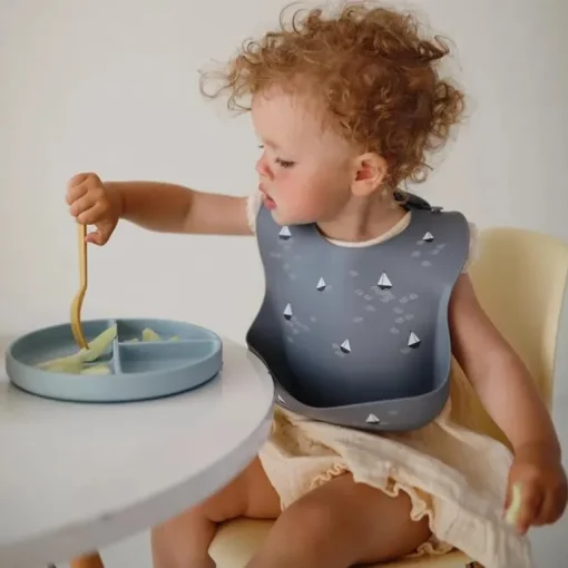Mushie - Silicone Baby Bib, Boats