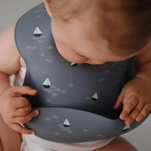 Mushie - Silicone Baby Bib, Boats