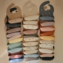 Mushie - Silicone Baby Bib, Dinosaurs