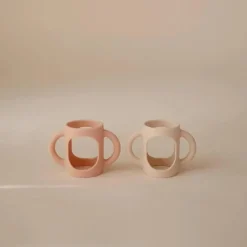 Mushie - Silicone Bottles Handles, Blush/Shifting Sand