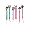 Nuby Felt Pacifinder, as cores podem variar