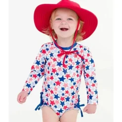 Rufflebutts – Shimmer Star-Spangled manga comprida One Piece Rash Guard branco com estrelas