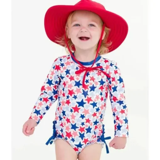 Rufflebutts – Shimmer Star-Spangled manga comprida One Piece Rash Guard branco com estrelas