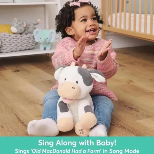 Spin Master - Baby GUND Buttermilk the Cow Pelúcia Animada, Animal Cantante, 12"