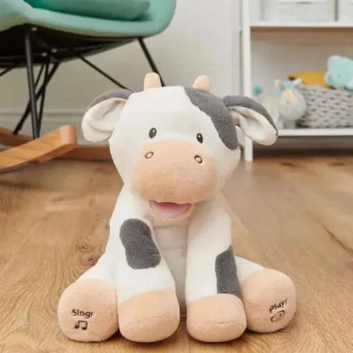 Spin Master - Baby GUND Buttermilk the Cow Pelúcia Animada, Animal Cantante, 12"