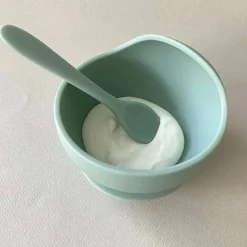 Tigela e colher de sucção Ali + Oli (Hortelã)